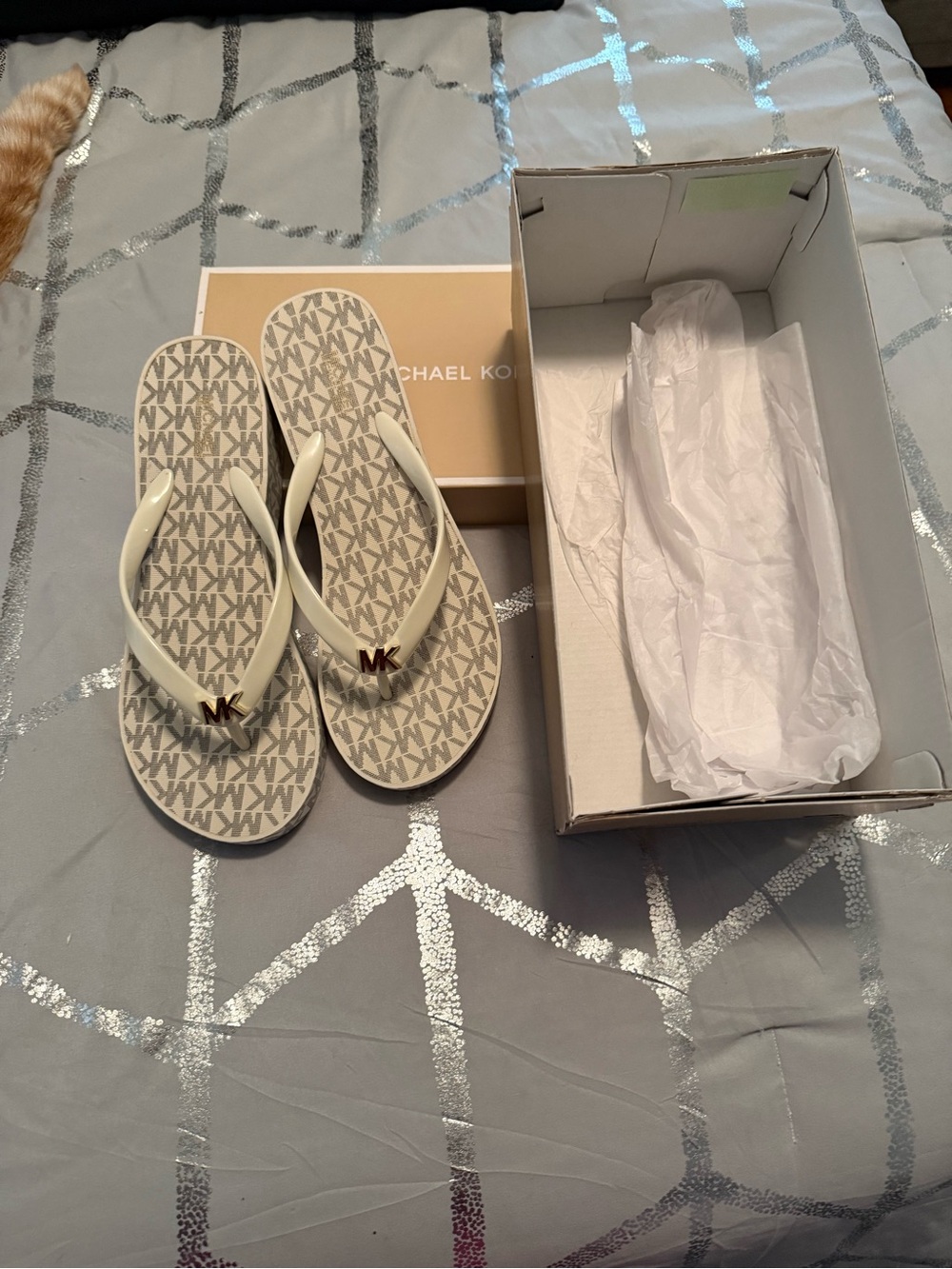 Michael Kors Cream Logo Flip Flop Sandals with Gold MK Charm